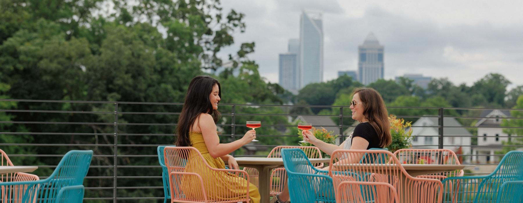 two women sitting at a table