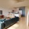a living room with a blue couch