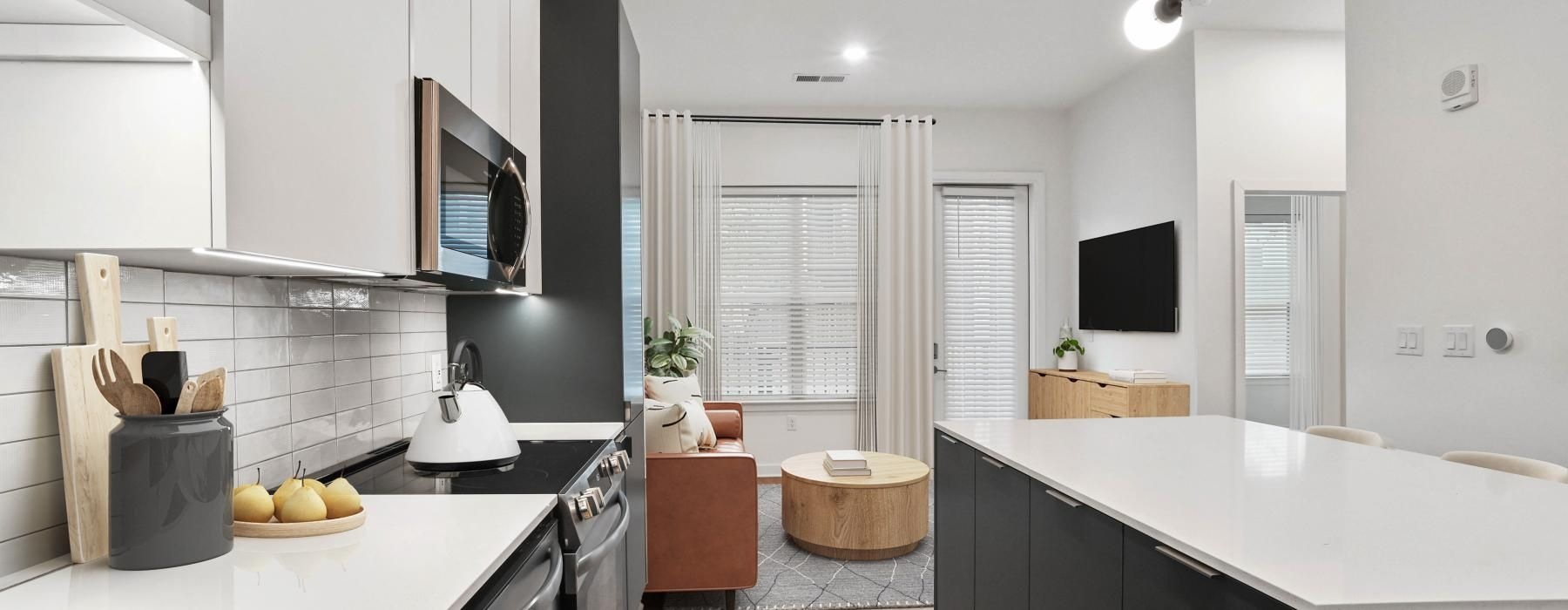 a kitchen with white cabinets