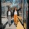 two women walking down a sidewalk