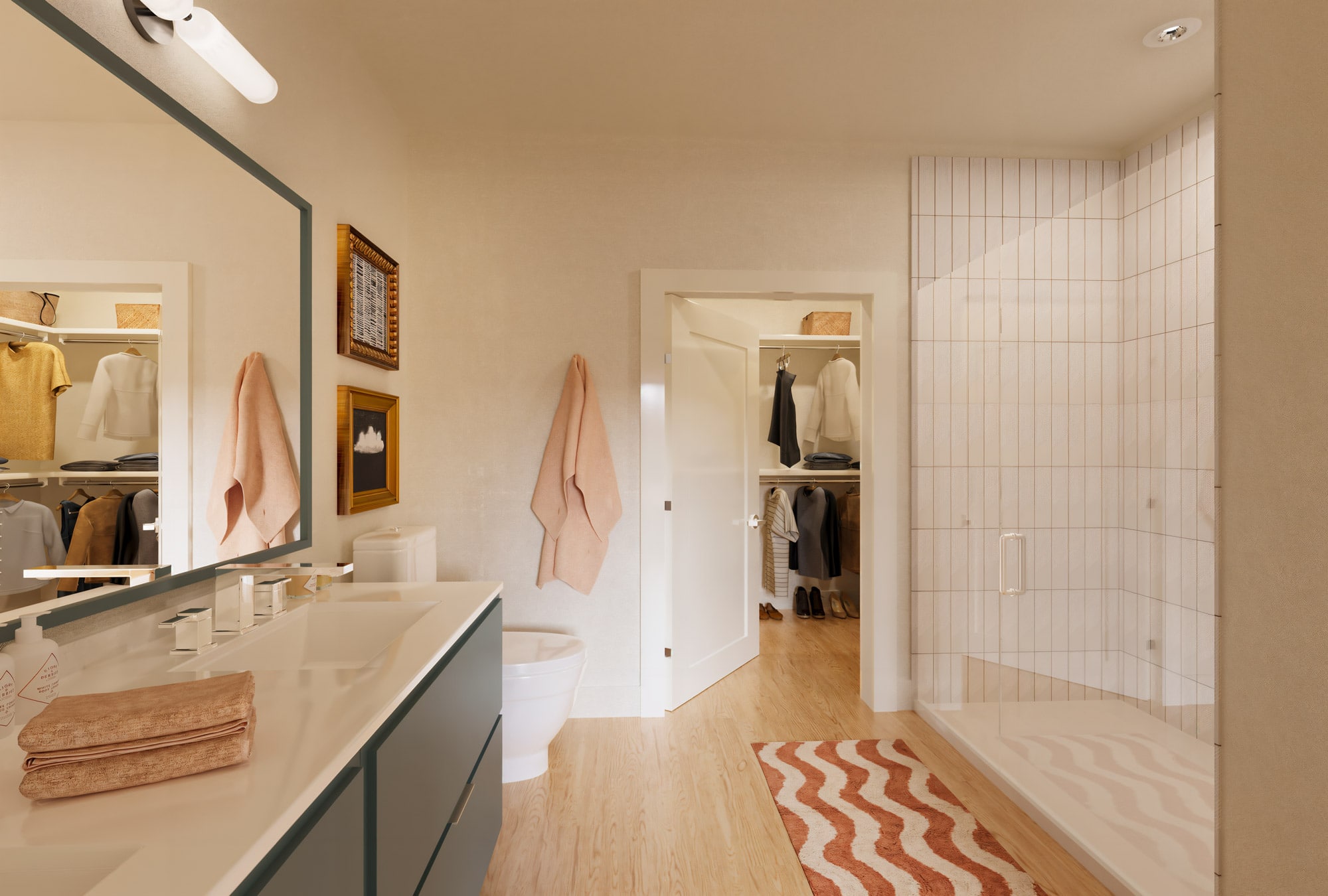 modern apartment bathroom with door to walk-in closet